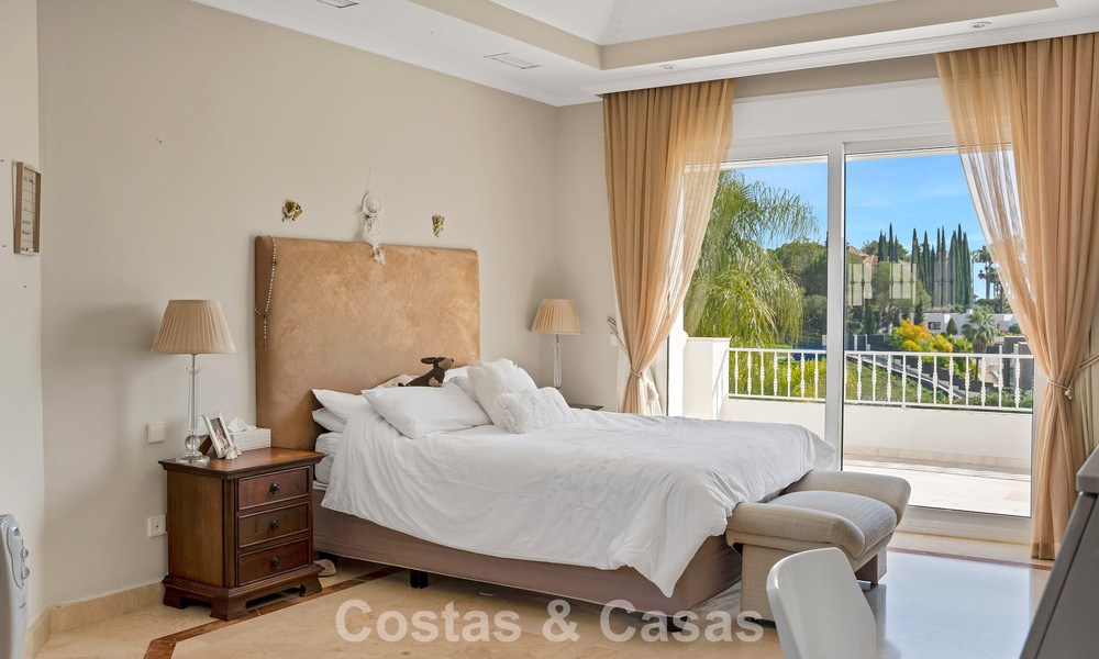 Stately luxury Andalusian-style mansion with sea views in Nueva Andalucia's golf valley, Marbella 779196