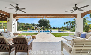 Stately luxury Andalusian-style mansion with sea views in Nueva Andalucia's golf valley, Marbella 779199 