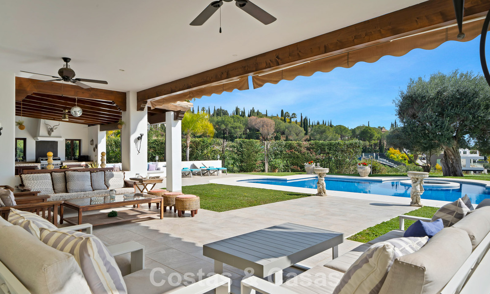 Stately luxury Andalusian-style mansion with sea views in Nueva Andalucia's golf valley, Marbella 779201