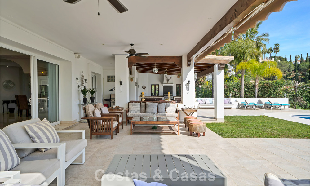 Stately luxury Andalusian-style mansion with sea views in Nueva Andalucia's golf valley, Marbella 779202