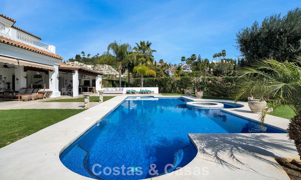 Stately luxury Andalusian-style mansion with sea views in Nueva Andalucia's golf valley, Marbella 779204