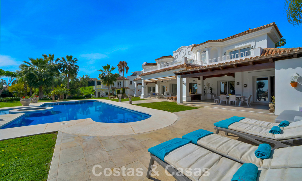 Stately luxury Andalusian-style mansion with sea views in Nueva Andalucia's golf valley, Marbella 779206