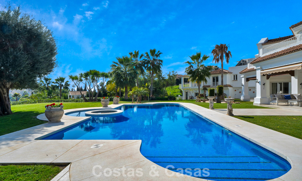 Stately luxury Andalusian-style mansion with sea views in Nueva Andalucia's golf valley, Marbella 779207