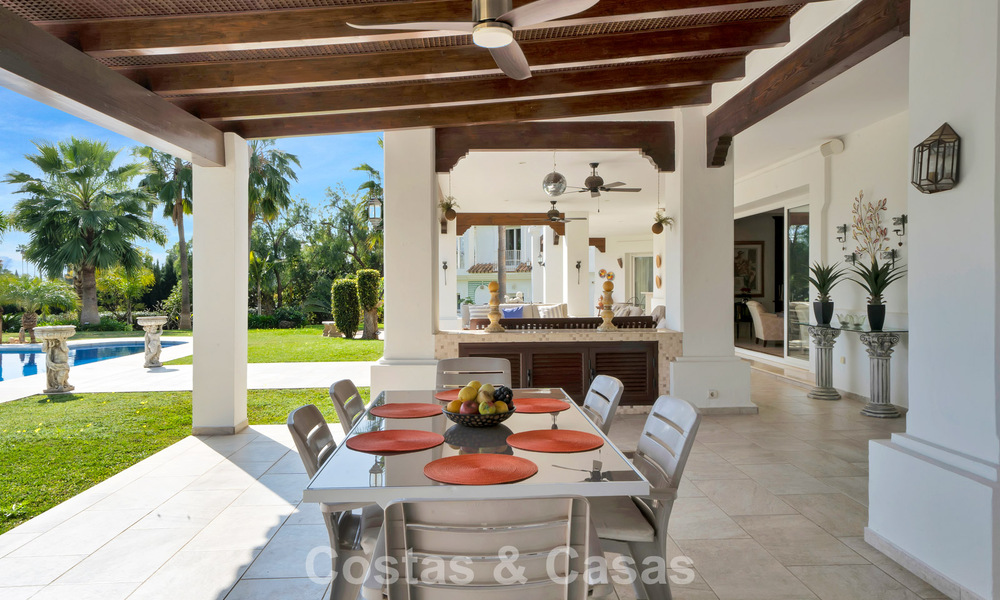 Stately luxury Andalusian-style mansion with sea views in Nueva Andalucia's golf valley, Marbella 779209