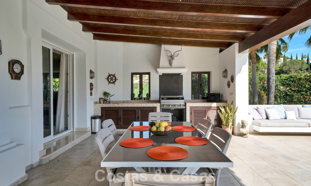 Stately luxury Andalusian-style mansion with sea views in Nueva Andalucia's golf valley, Marbella 779211