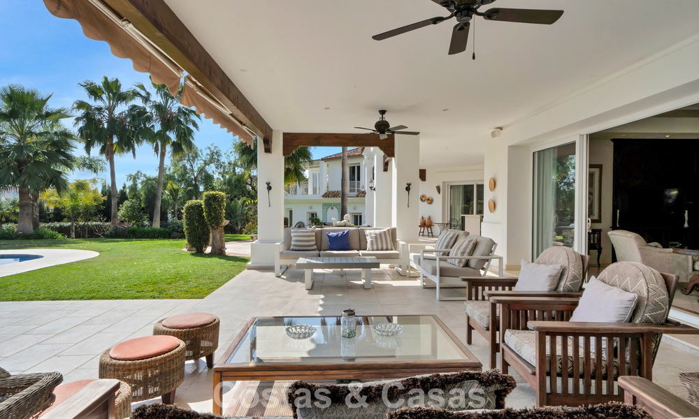 Stately luxury Andalusian-style mansion with sea views in Nueva Andalucia's golf valley, Marbella 779212