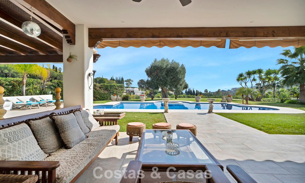 Stately luxury Andalusian-style mansion with sea views in Nueva Andalucia's golf valley, Marbella 779213