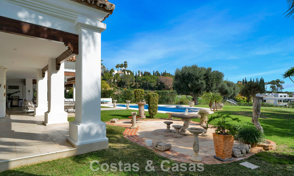 Stately luxury Andalusian-style mansion with sea views in Nueva Andalucia's golf valley, Marbella 779214