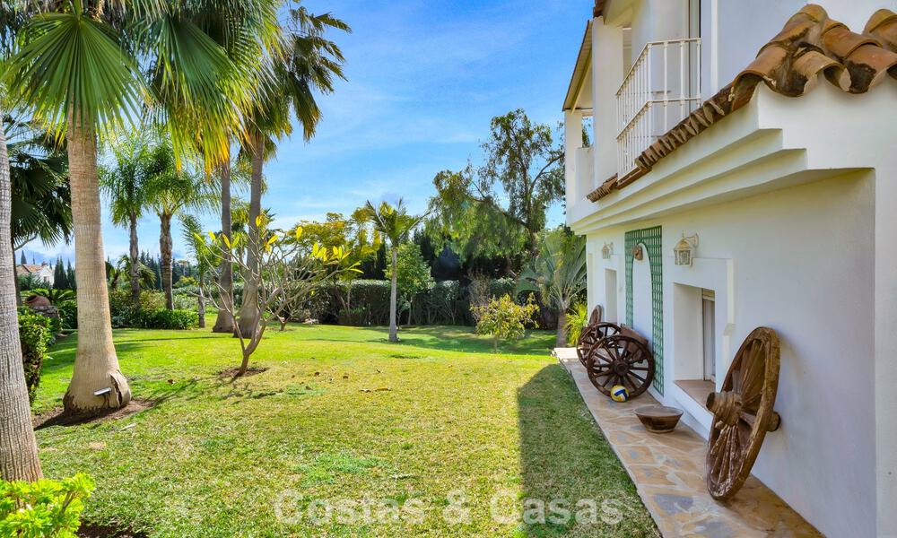 Stately luxury Andalusian-style mansion with sea views in Nueva Andalucia's golf valley, Marbella 779215