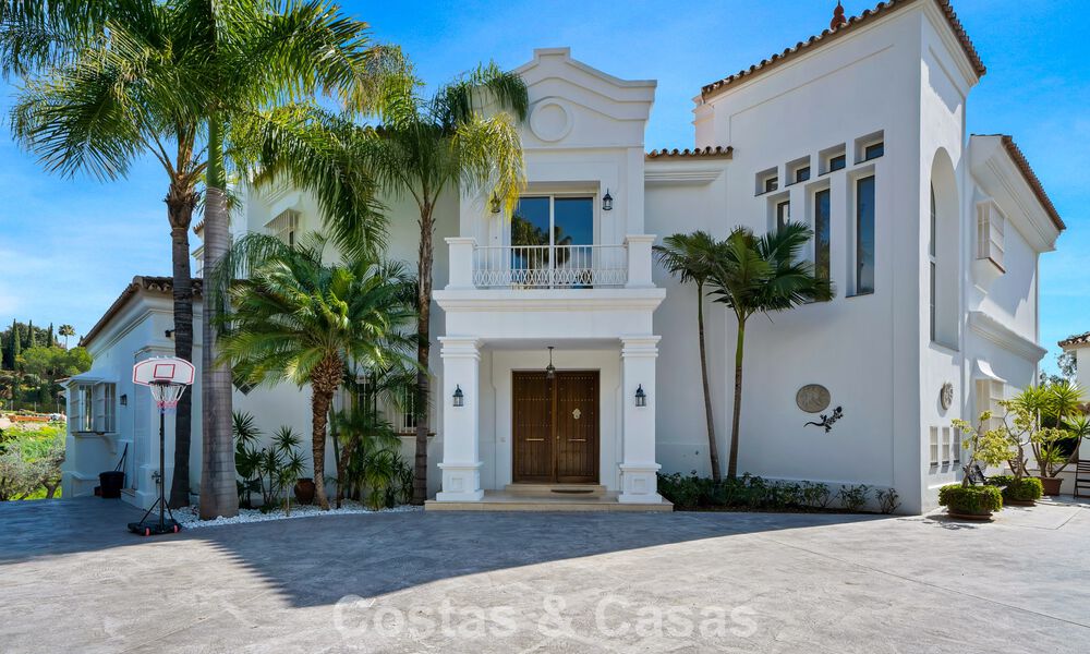 Stately luxury Andalusian-style mansion with sea views in Nueva Andalucia's golf valley, Marbella 779216
