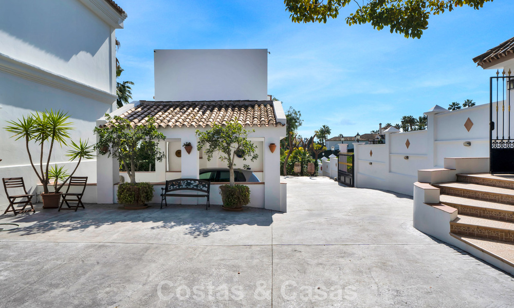 Stately luxury Andalusian-style mansion with sea views in Nueva Andalucia's golf valley, Marbella 779217
