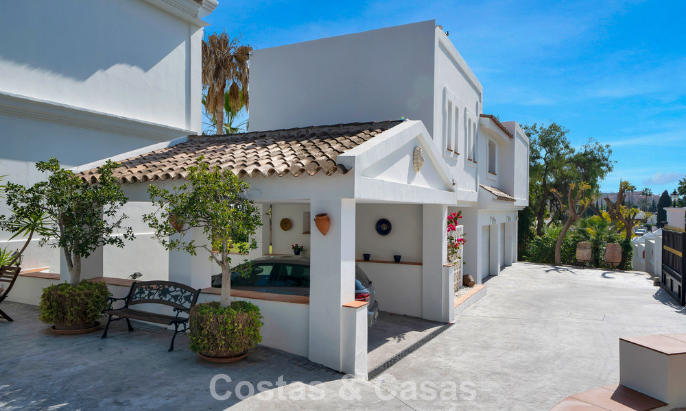 Stately luxury Andalusian-style mansion with sea views in Nueva Andalucia's golf valley, Marbella 779218