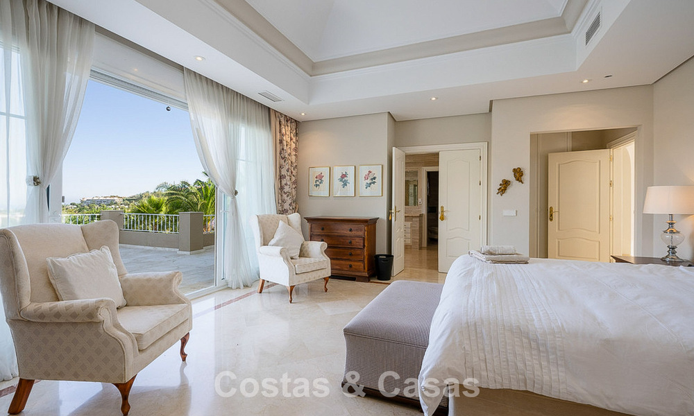 Stately luxury Andalusian-style mansion with sea views in Nueva Andalucia's golf valley, Marbella 779221