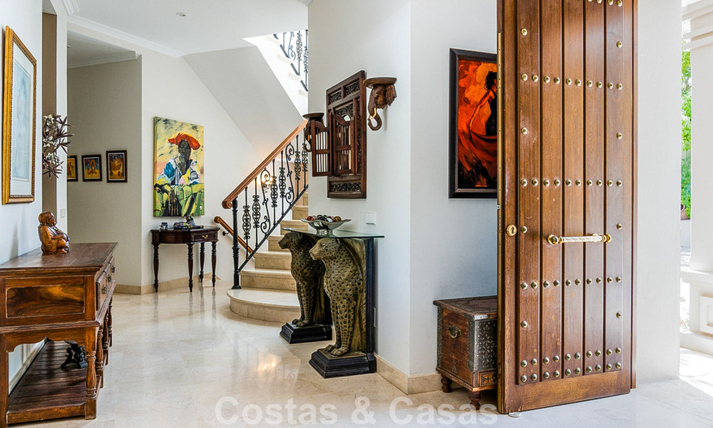 Stately luxury Andalusian-style mansion with sea views in Nueva Andalucia's golf valley, Marbella 779223