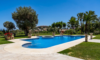 Stately luxury Andalusian-style mansion with sea views in Nueva Andalucia's golf valley, Marbella 779224 