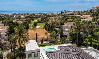 New, modernist designer villa for sale with golf course views in a golf resort, Marbella - Benahavis 55434 