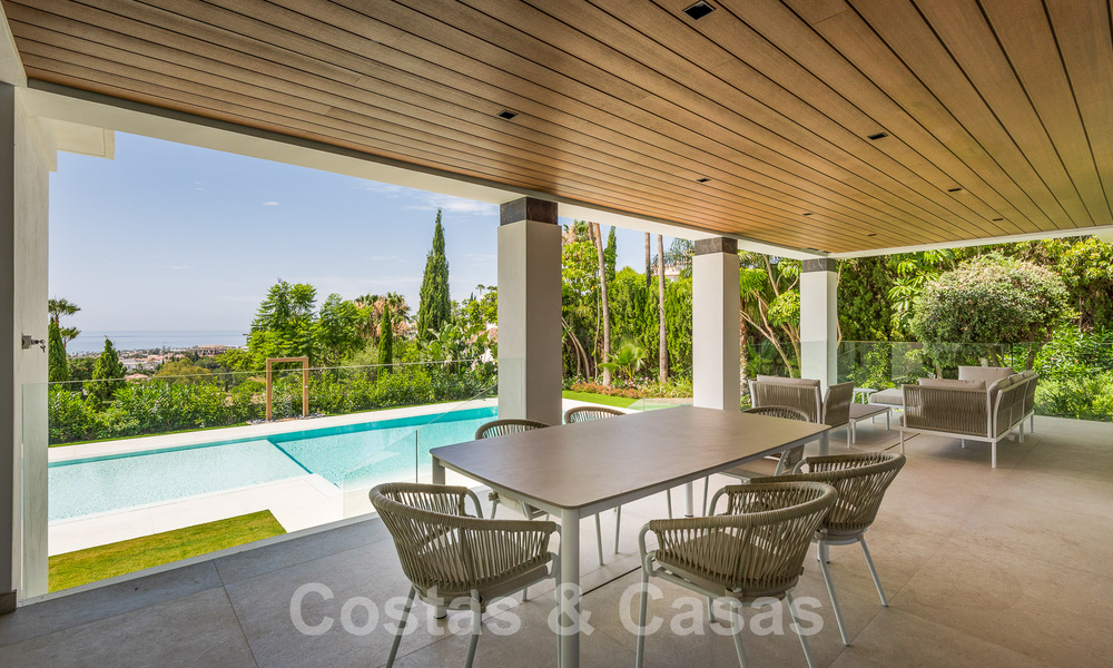New, modernist designer villa for sale with golf course views in a golf resort, Marbella - Benahavis 55510