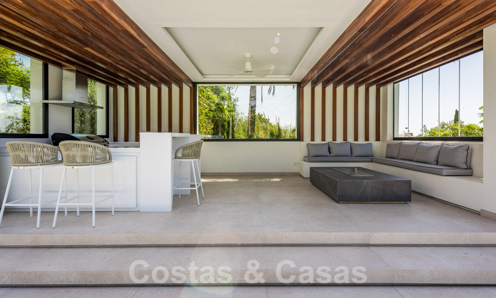 New, modernist designer villa for sale with golf course views in a golf resort, Marbella - Benahavis 55512
