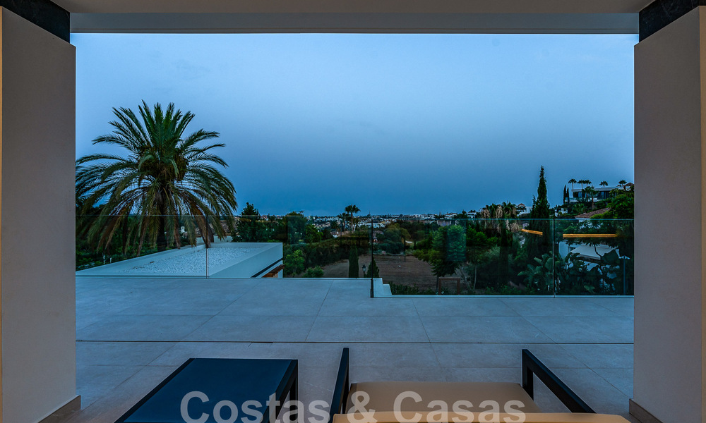 New, modernist designer villa for sale with golf course views in a golf resort, Marbella - Benahavis 55522