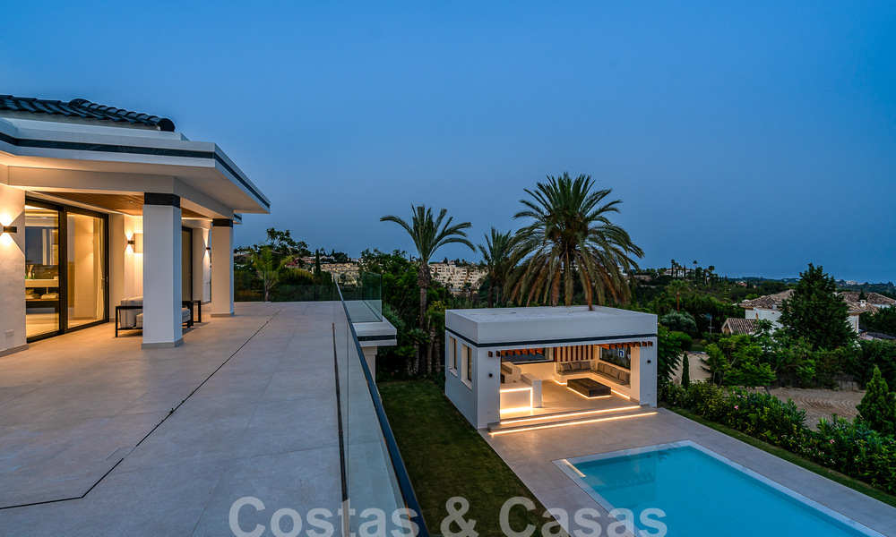 New, modernist designer villa for sale with golf course views in a golf resort, Marbella - Benahavis 55525