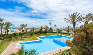 Mediterranean villa for sale with contemporary interior and frontal sea views in gated beachside urbanisation of Estepona 55783 