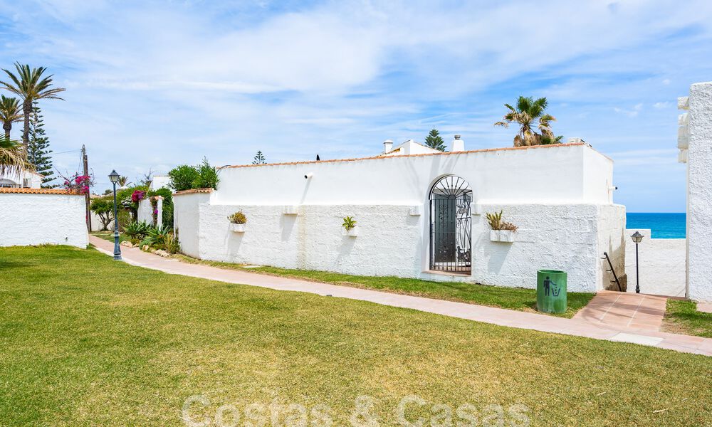 Mediterranean villa for sale with contemporary interior and frontal sea views in gated beachside urbanisation of Estepona 55784