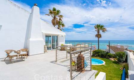 Mediterranean villa for sale with contemporary interior and frontal sea views in gated beachside urbanisation of Estepona 55795