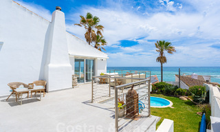 Mediterranean villa for sale with contemporary interior and frontal sea views in gated beachside urbanisation of Estepona 55795 