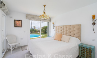 Mediterranean villa for sale with contemporary interior and frontal sea views in gated beachside urbanisation of Estepona 55815 