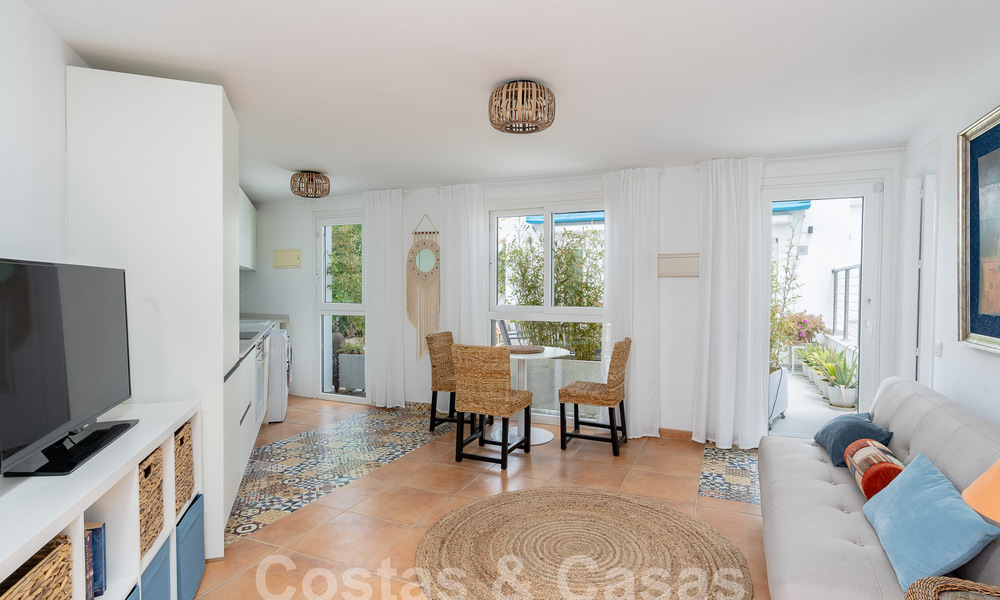 Mediterranean villa for sale with contemporary interior and frontal sea views in gated beachside urbanisation of Estepona 55816