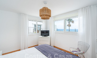 Mediterranean villa for sale with contemporary interior and frontal sea views in gated beachside urbanisation of Estepona 55819 