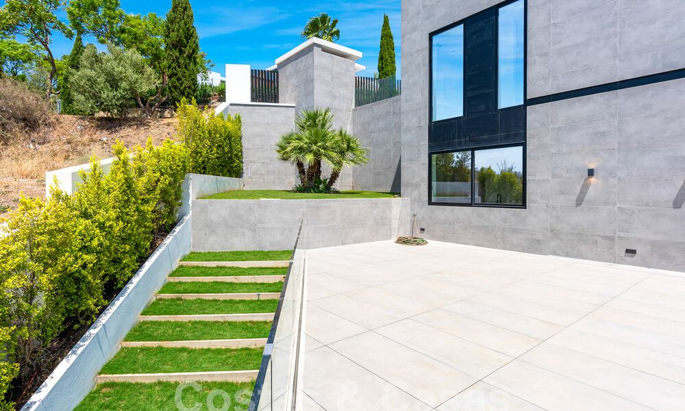 New, modernist designer villa for sale with stunning sea views in five-star golf resort in Marbella - Benahavis 55829