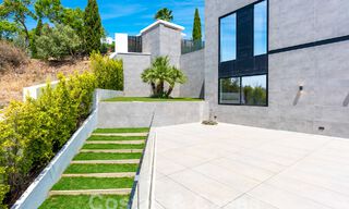 New, modernist designer villa for sale with stunning sea views in five-star golf resort in Marbella - Benahavis 55829 