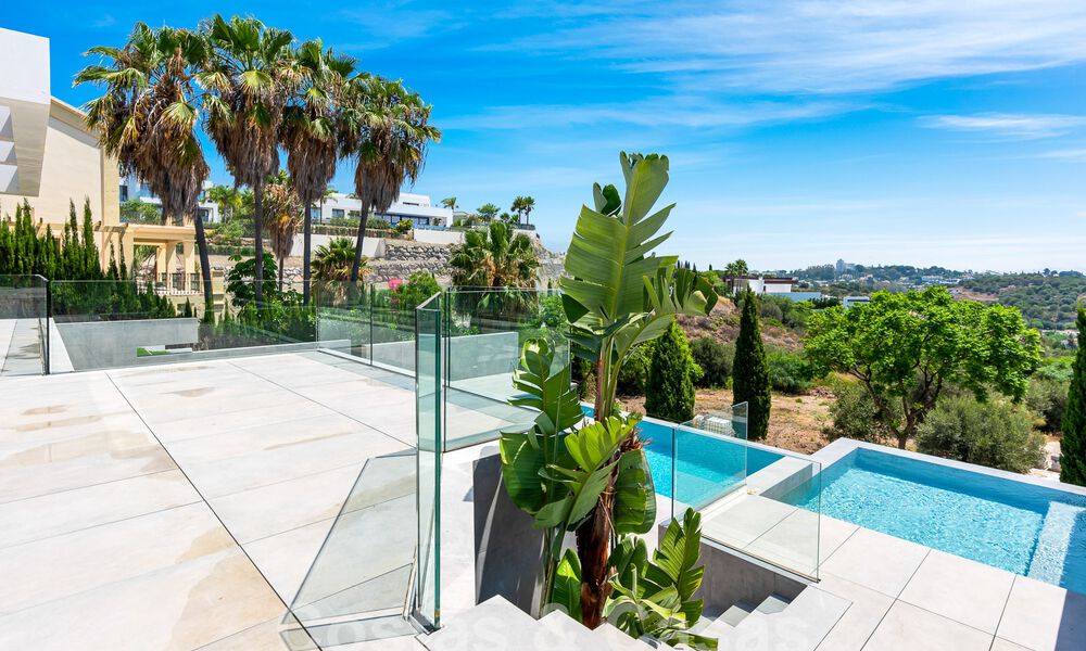New, modernist designer villa for sale with stunning sea views in five-star golf resort in Marbella - Benahavis 55830