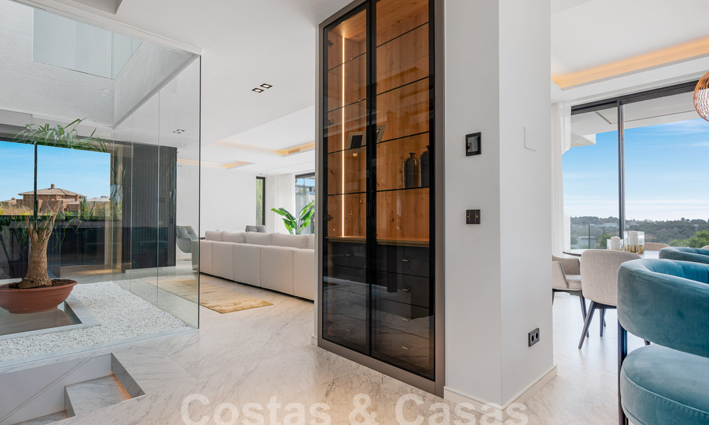 New, modernist designer villa for sale with stunning sea views in five-star golf resort in Marbella - Benahavis 55864