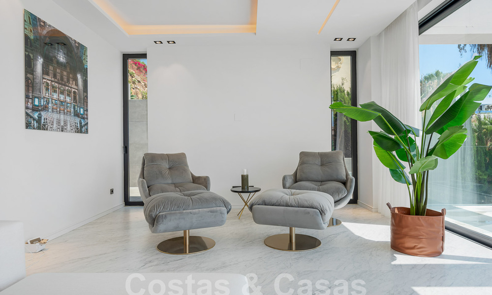 New, modernist designer villa for sale with stunning sea views in five-star golf resort in Marbella - Benahavis 55872