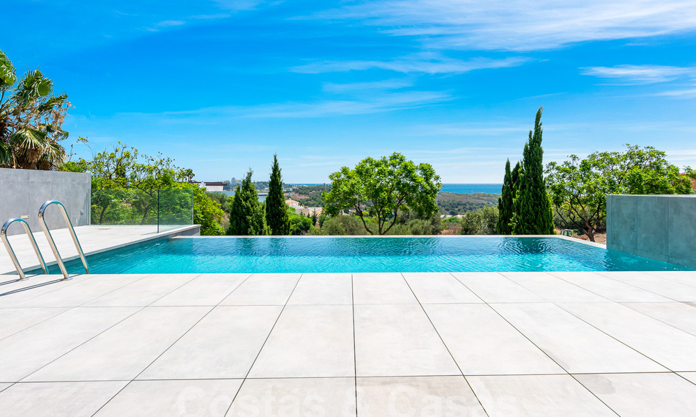 New, modernist designer villa for sale with stunning sea views in five-star golf resort in Marbella - Benahavis 55892