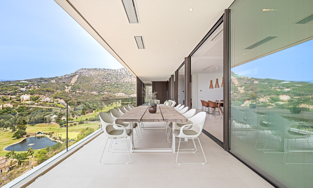 Move-in ready, ultra-modern luxury villa for sale on frontline golf in the prestigious Marbella Club Golf Resort in Benahavis 56135