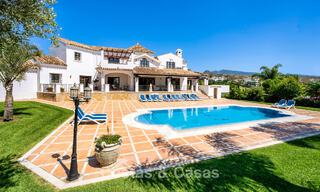 Luxury Andalusian-style villa surrounded by greenery on a large plot in Marbella - Estepona 56301 