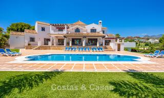 Luxury Andalusian-style villa surrounded by greenery on a large plot in Marbella - Estepona 56304 