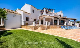 Luxury Andalusian-style villa surrounded by greenery on a large plot in Marbella - Estepona 56306 