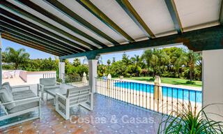 Luxury Andalusian-style villa surrounded by greenery on a large plot in Marbella - Estepona 56307 