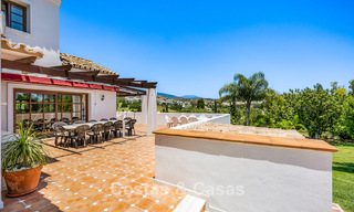 Luxury Andalusian-style villa surrounded by greenery on a large plot in Marbella - Estepona 56308 