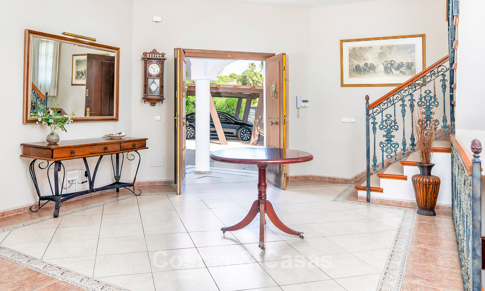 Luxury Andalusian-style villa surrounded by greenery on a large plot in Marbella - Estepona 56310