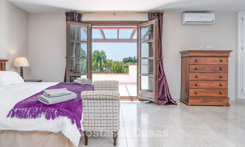 Luxury Andalusian-style villa surrounded by greenery on a large plot in Marbella - Estepona 56329