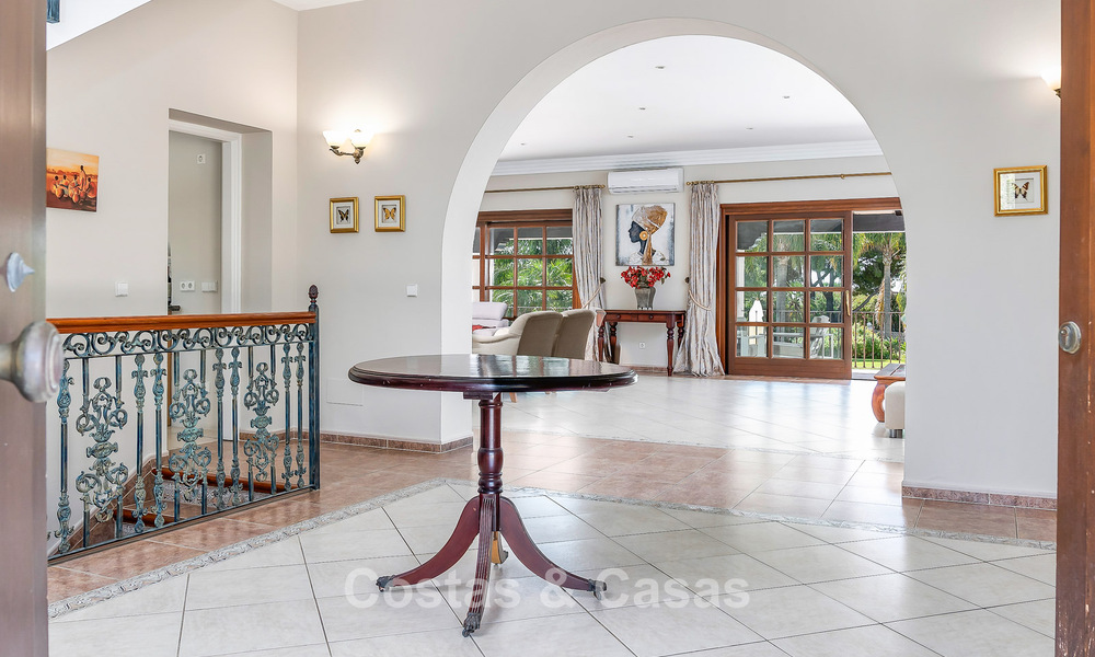 Luxury Andalusian-style villa surrounded by greenery on a large plot in Marbella - Estepona 56360