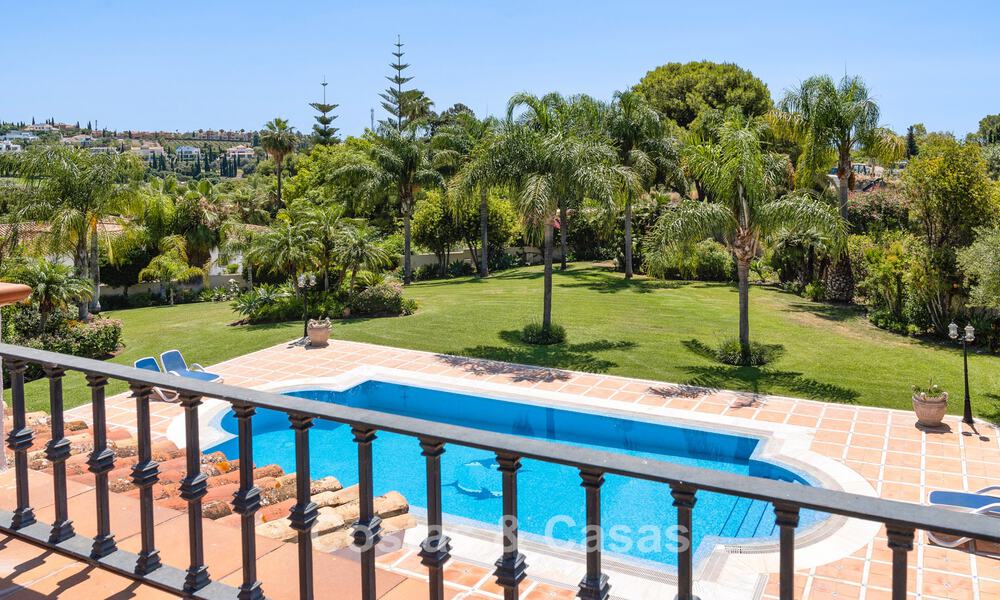 Luxury Andalusian-style villa surrounded by greenery on a large plot in Marbella - Estepona 56370