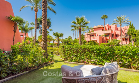Luxury garden apartment for sale in a frontline beach complex on the New Golden Mile between Marbella and Estepona centre 56625