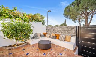 Masterfully renovated townhouse for sale in gated complex, frontline Aloha Golf, walking distance to the clubhouse in Nueva Andalucia, Marbella 56586 
