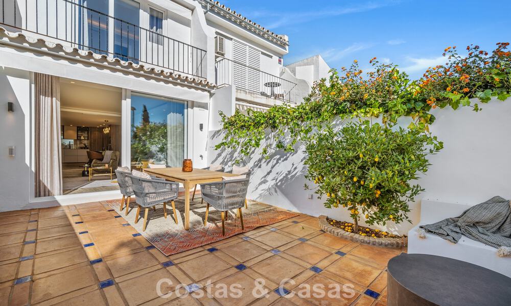 Masterfully renovated townhouse for sale in gated complex, frontline Aloha Golf, walking distance to the clubhouse in Nueva Andalucia, Marbella 56587